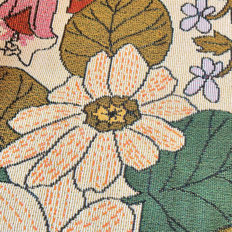 Couverture tapisserie à fleurs colorées