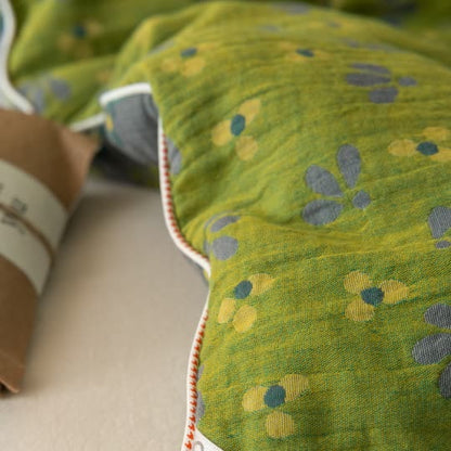 Couette double épaisseur en gaze jacquard à motif floral