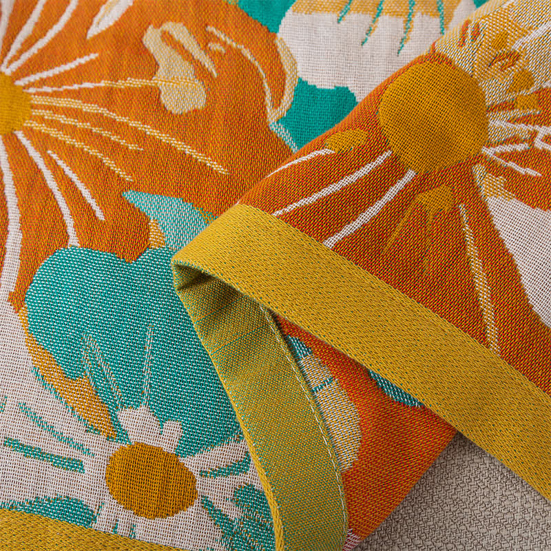 Serviette de bain en gaze de coton avec des fleurs en fleurs