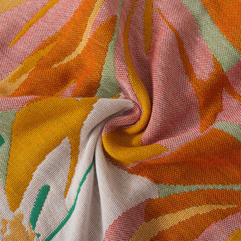 Serviette en gaze de coton respirante avec motif floral vibrant