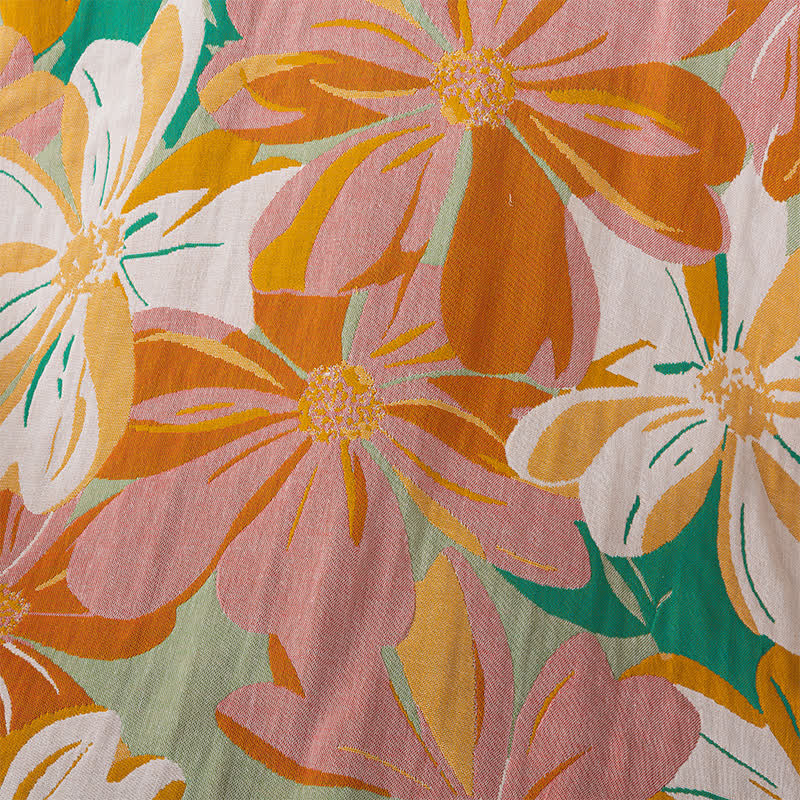 Serviette en gaze de coton respirante avec motif floral vibrant
