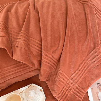 Parure de lit en flanelle moelleuse et de couleur unie (4 pièces)
