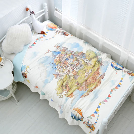 Couverture bébé en coton avec un château de style Pays des Merveilles