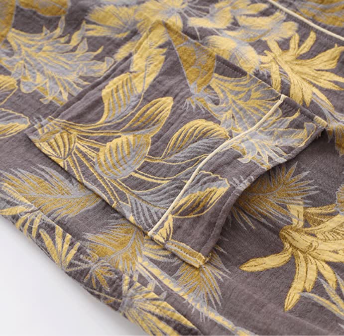 Peignoir en gaze de coton respirant avec des feuilles tropicales