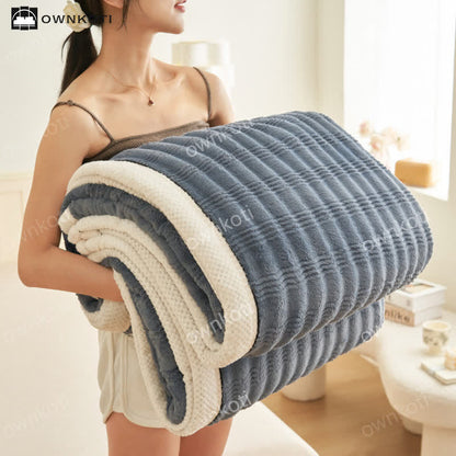 Couverture polaire avec structure ondulée jacquard