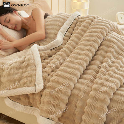 Couverture polaire avec structure ondulée jacquard