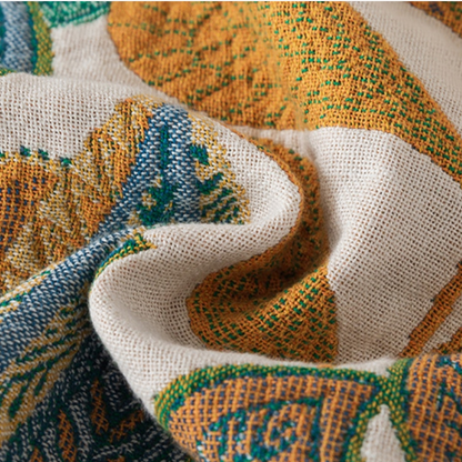 Couverture réversible en gaze de coton avec feuilles de palmier