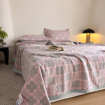 Couette en gaze de coton à trois couches avec des fleurs vibrantes