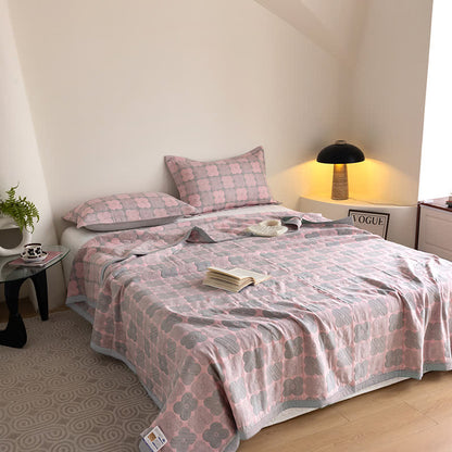 Couette en gaze de coton à trois couches avec des fleurs vibrantes