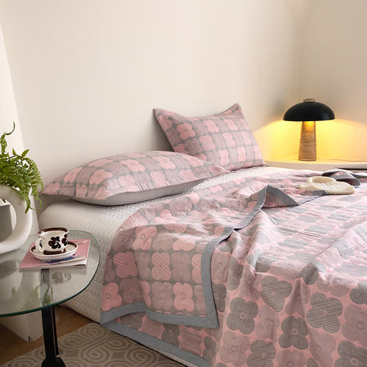 Couette en gaze de coton à trois couches avec des fleurs vibrantes