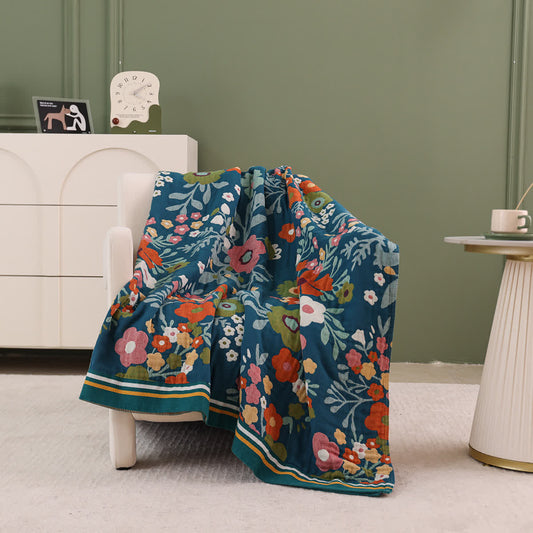 Couverture en gaze de coton douce avec des fleurs lumineuses