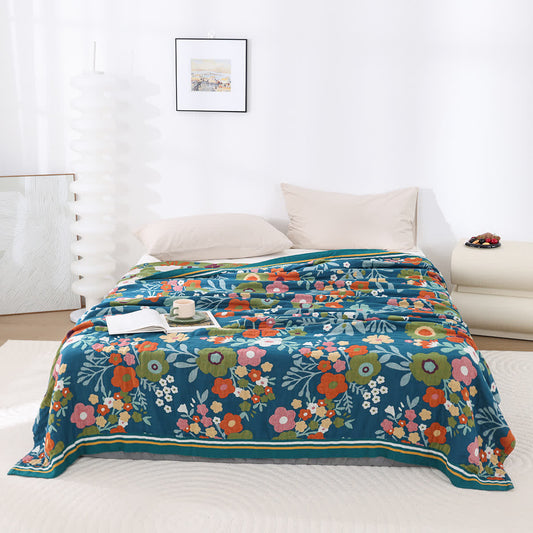 Couette en gaze de coton douce avec des fleurs lumineuses