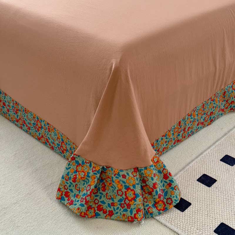 Collection de linge de lit confortable avec un imprimé floral lumineux