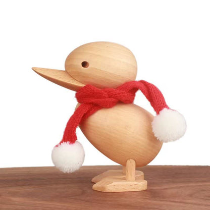 Canard en bois avec écharpe, décoration artisanale
