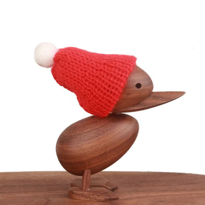 Canard en bois avec écharpe, décoration artisanale