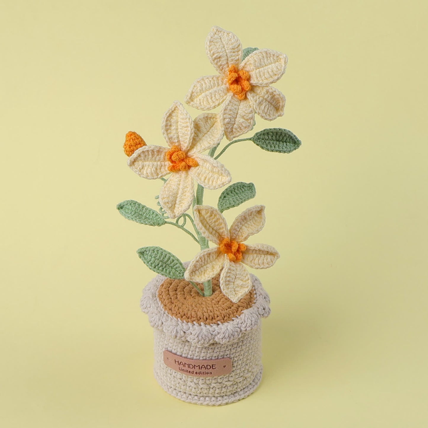 Ornement de fleurs tressées Clématite en pot