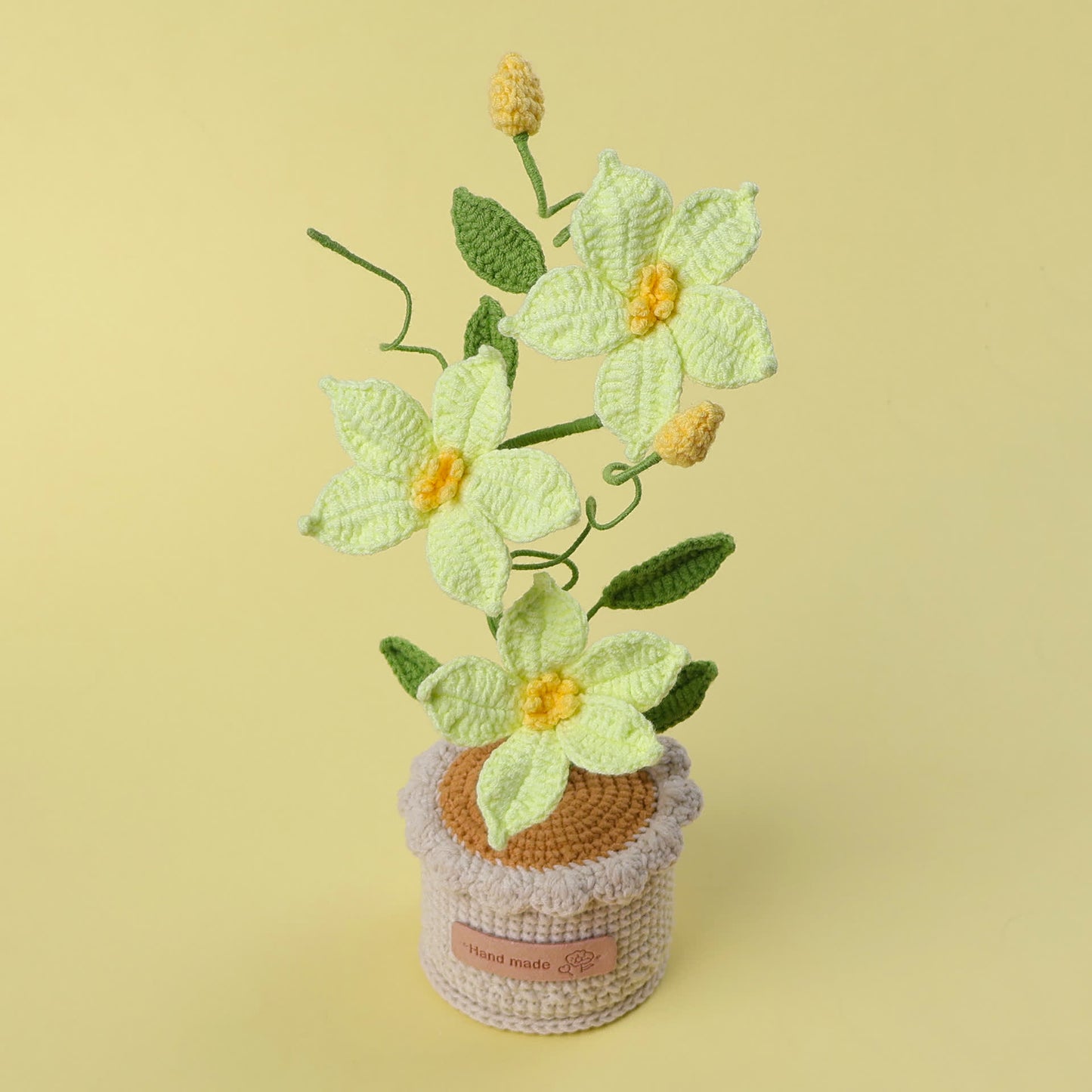 Ornement de fleurs tressées Clématite en pot
