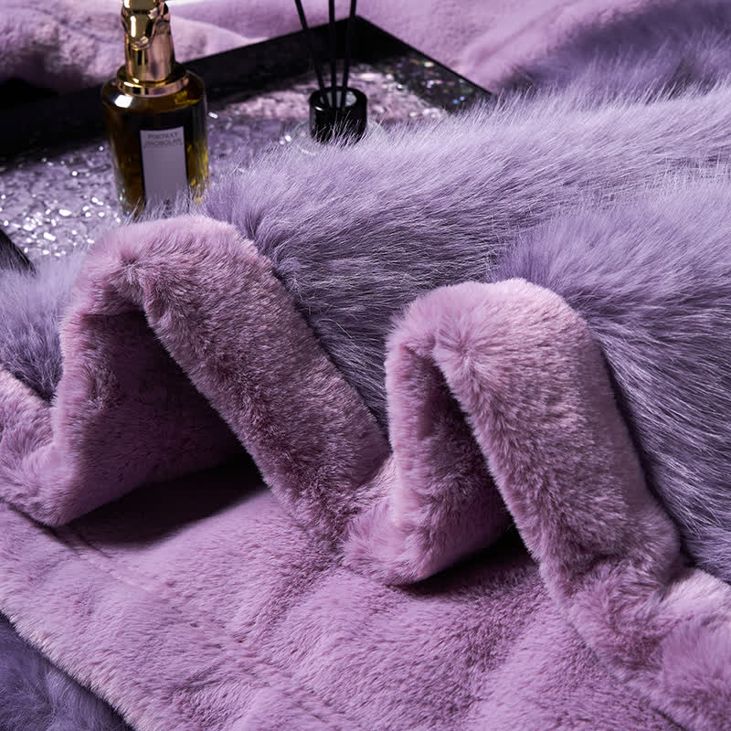 Couverture chaude avec dégradé de couleurs en fausse fourrure