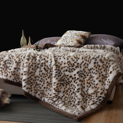 Couverture en fausse fourrure avec motif léopard des neiges