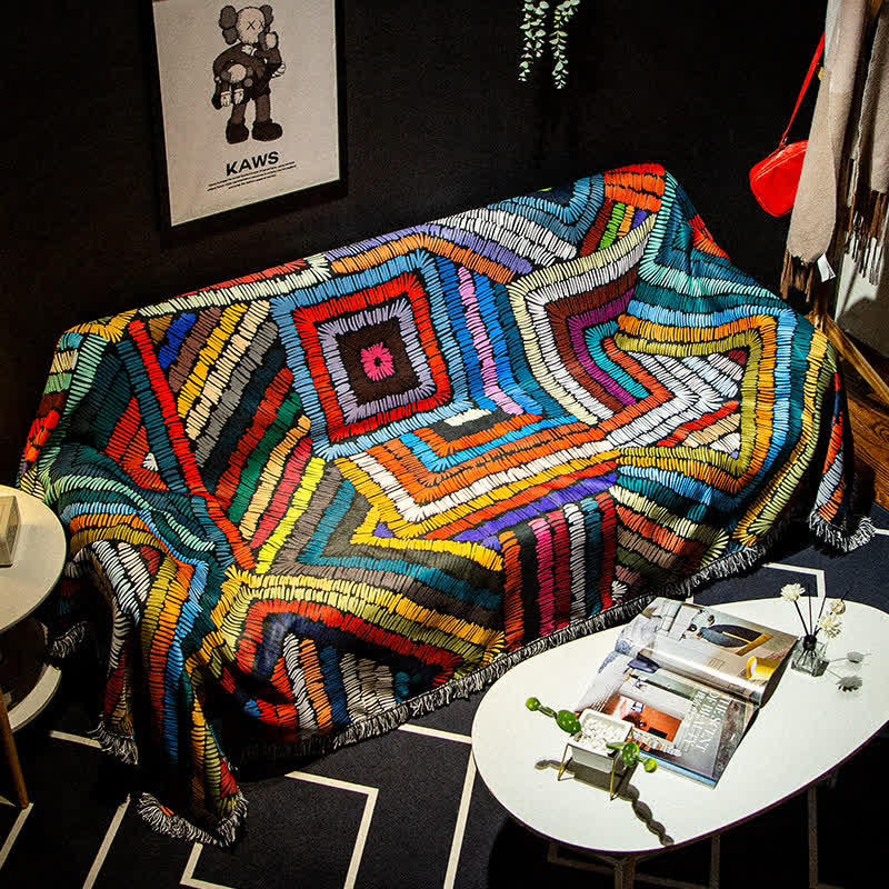 Housse de canapé bohème colorée antidérapante avec pompon