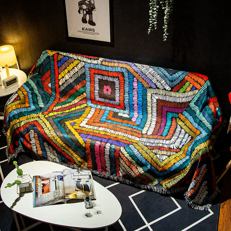 Housse de canapé bohème colorée antidérapante avec pompon