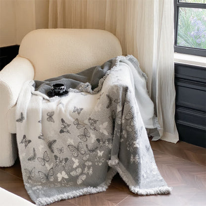 Couverture en fausse fourrure douce avec des papillons