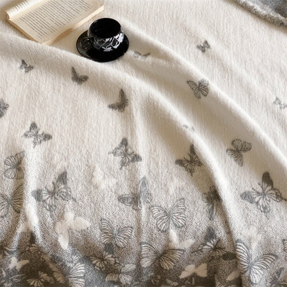 Couverture en fausse fourrure douce avec des papillons