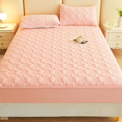 Drap-housse matelassé uni à motif floral