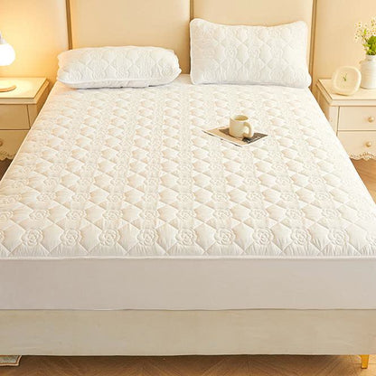 Drap-housse matelassé uni à motif floral