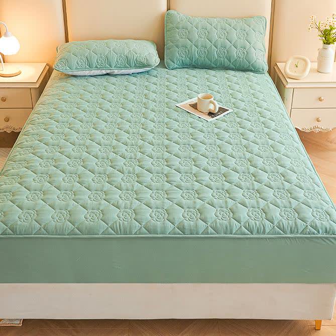 Drap-housse matelassé uni à motif floral
