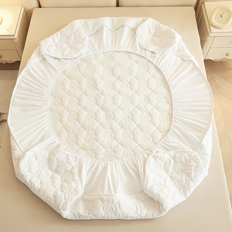 Drap-housse matelassé uni à motif floral