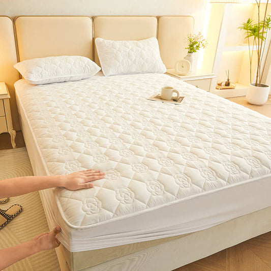 Drap-housse matelassé uni à motif floral