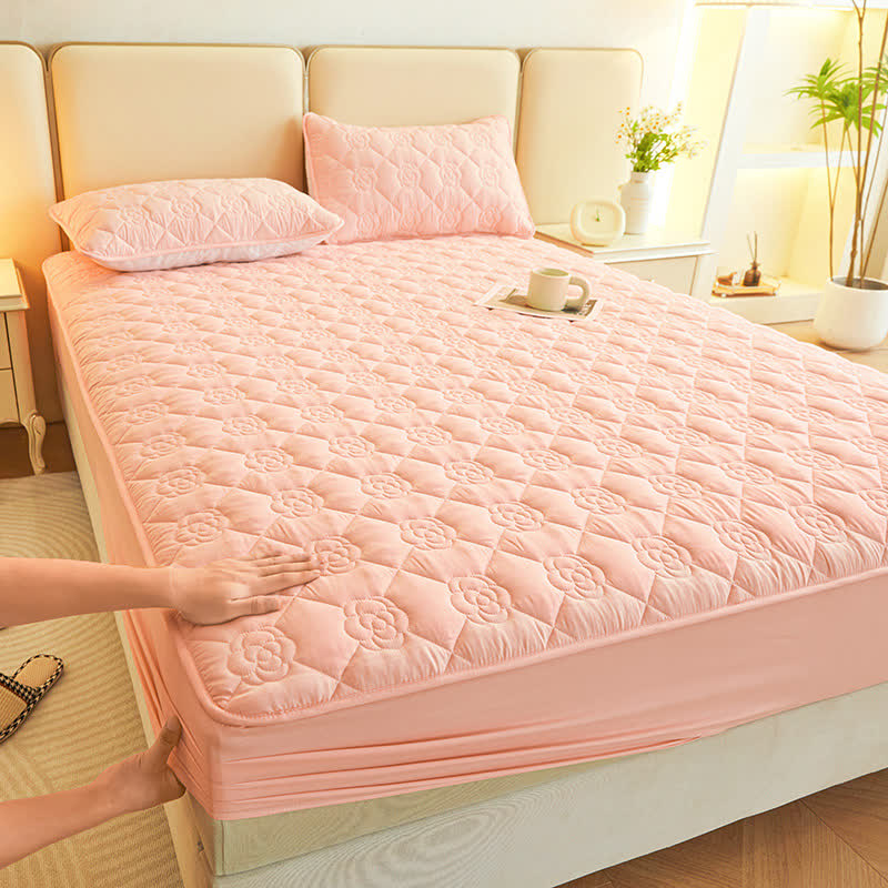 Drap-housse matelassé uni à motif floral