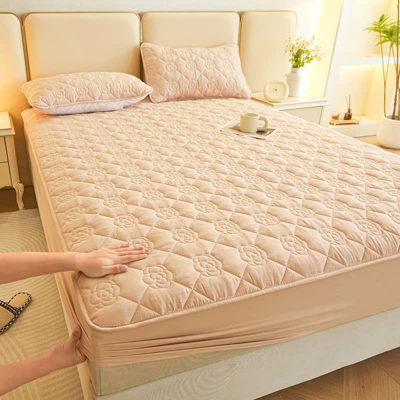 Drap-housse matelassé uni à motif floral