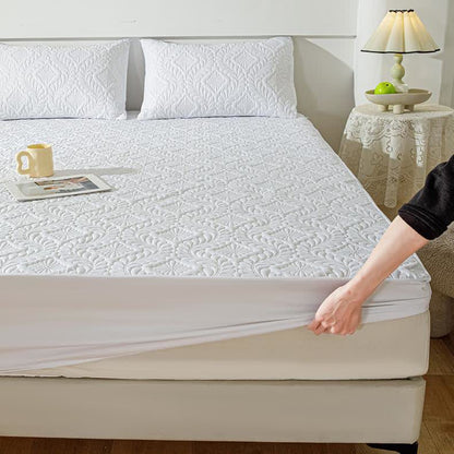 Drap-housse imperméable, uni et matelassé