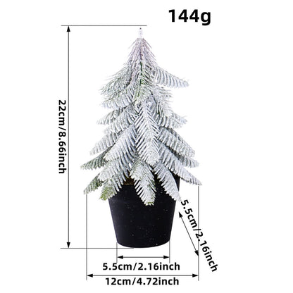 Sapin de Noël enneigé comme décoration en pot pour la maison