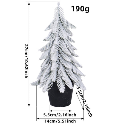 Sapin de Noël enneigé comme décoration en pot pour la maison