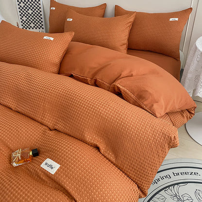 Parure de lit à structure gaufrée et aspect uni (4 pièces)