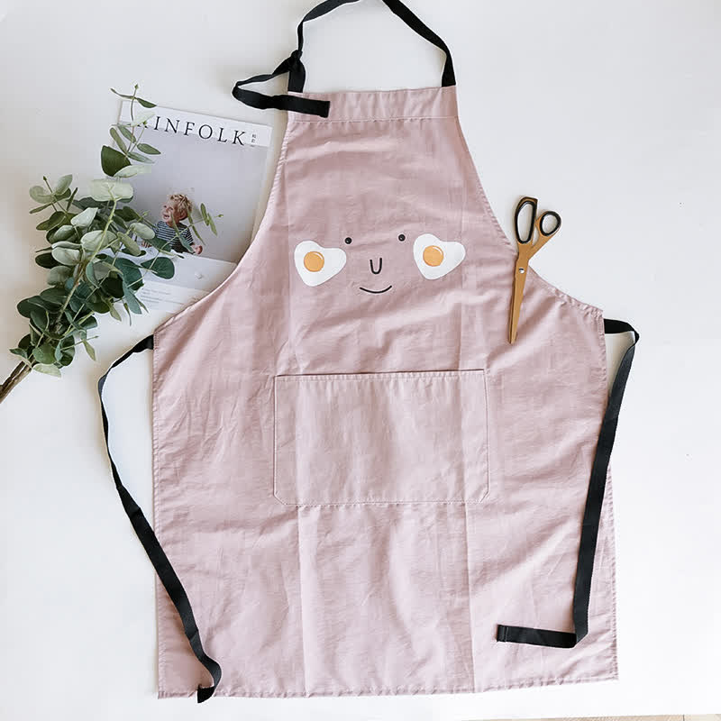 Sourire d'œuf au plat, tablier imperméable parent-enfant