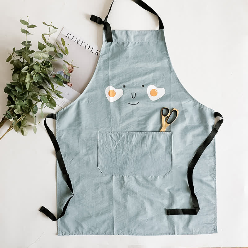 Sourire d'œuf au plat, tablier imperméable parent-enfant