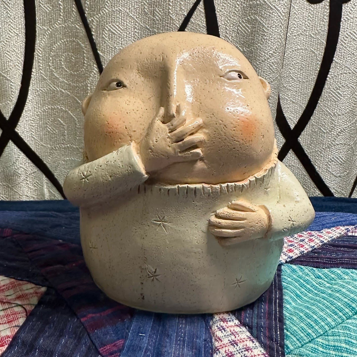 Statue en résine avec nez pincé