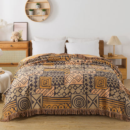 Couette réversible en gaze de coton de style bohème à motif géométrique