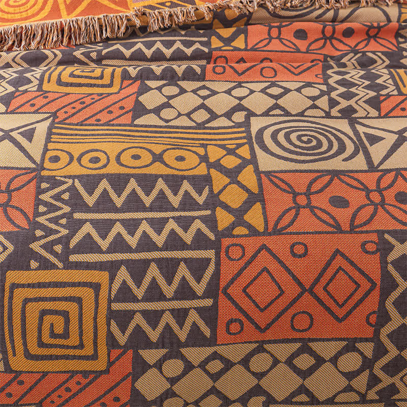 Couette réversible en gaze de coton de style bohème à motif géométrique