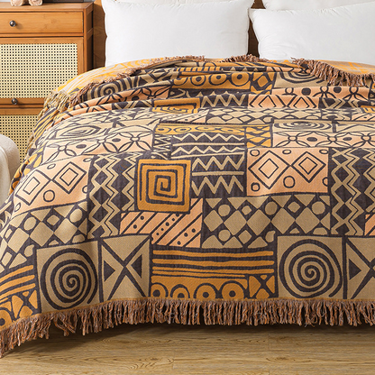 Couette réversible en gaze de coton de style bohème à motif géométrique