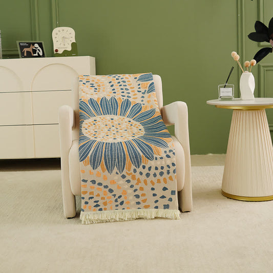 Couverture en gaze de coton avec pompons et tournesols en fleurs