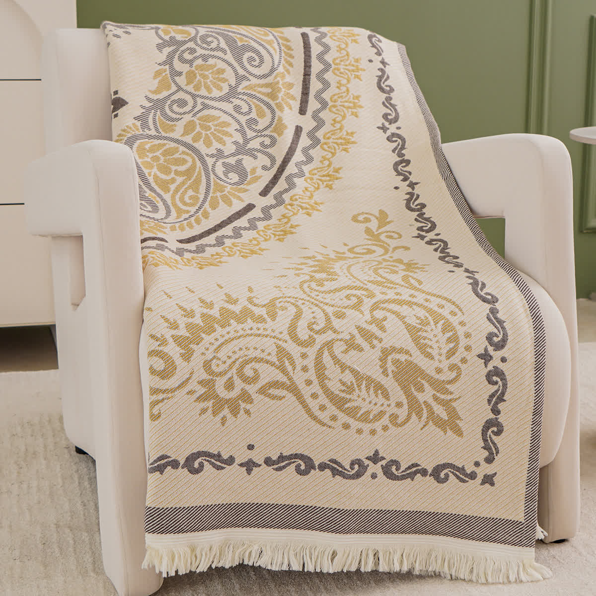Couette légère en gaze de coton avec pompons et motif cachemire