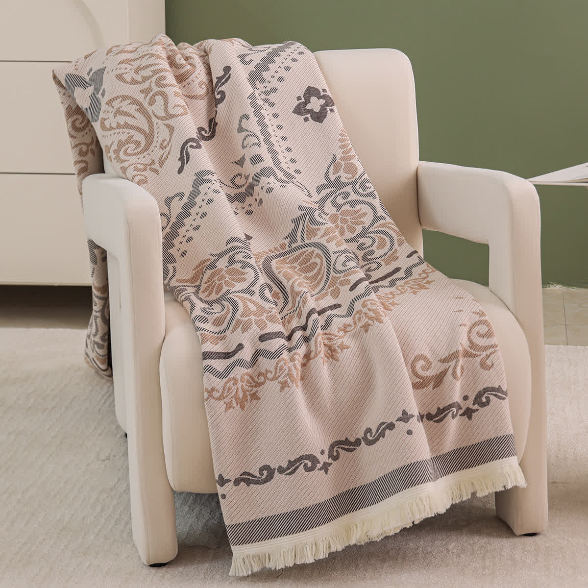 Couette légère en gaze de coton avec pompons et motif cachemire
