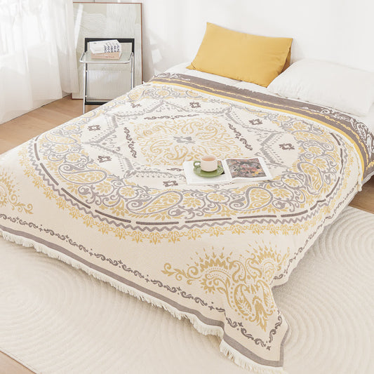 Couette légère en gaze de coton avec pompons et motif cachemire