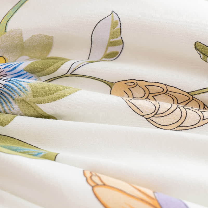 Couverture-oreiller portable avec motif floral et manches