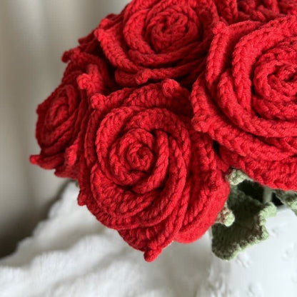 Ornement tissé à la main avec un bouquet de roses lumineuses
